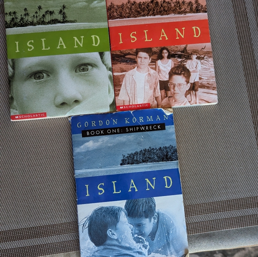 Scholastic Island Series by Gordon Korman - Green, Red, Blue Covers